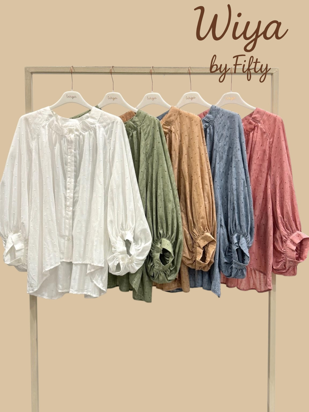 Blouse texturée à pois brodés